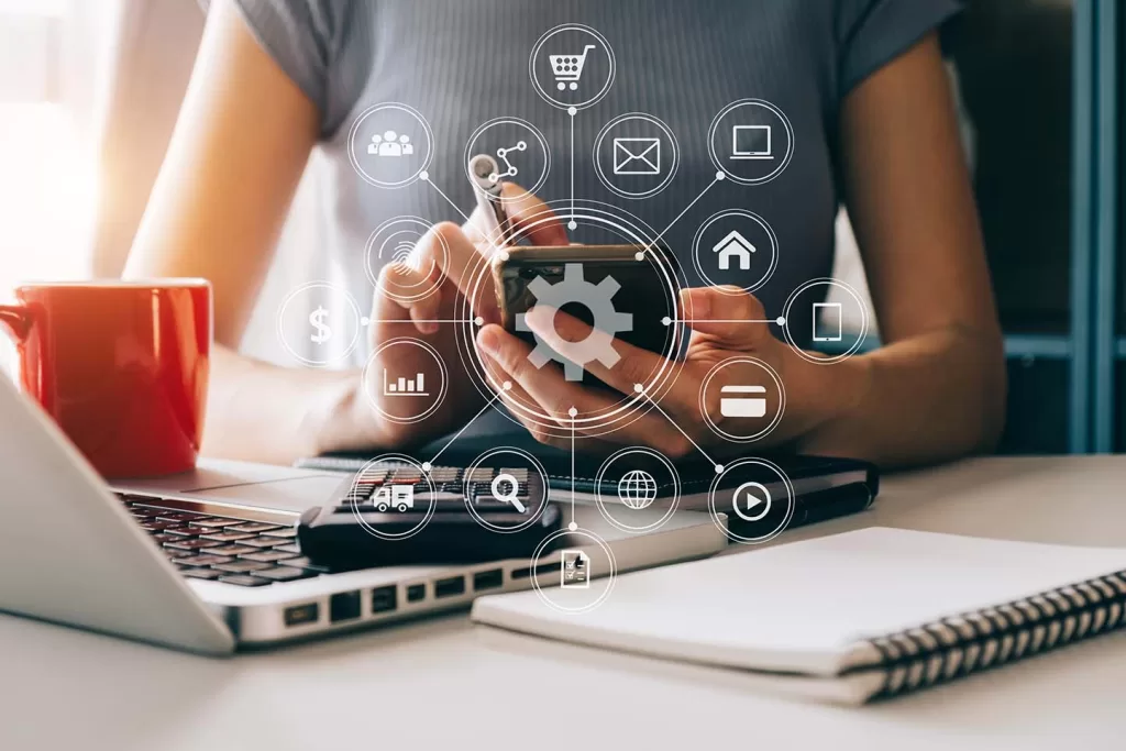 A woman using a cellphone with several tasks open