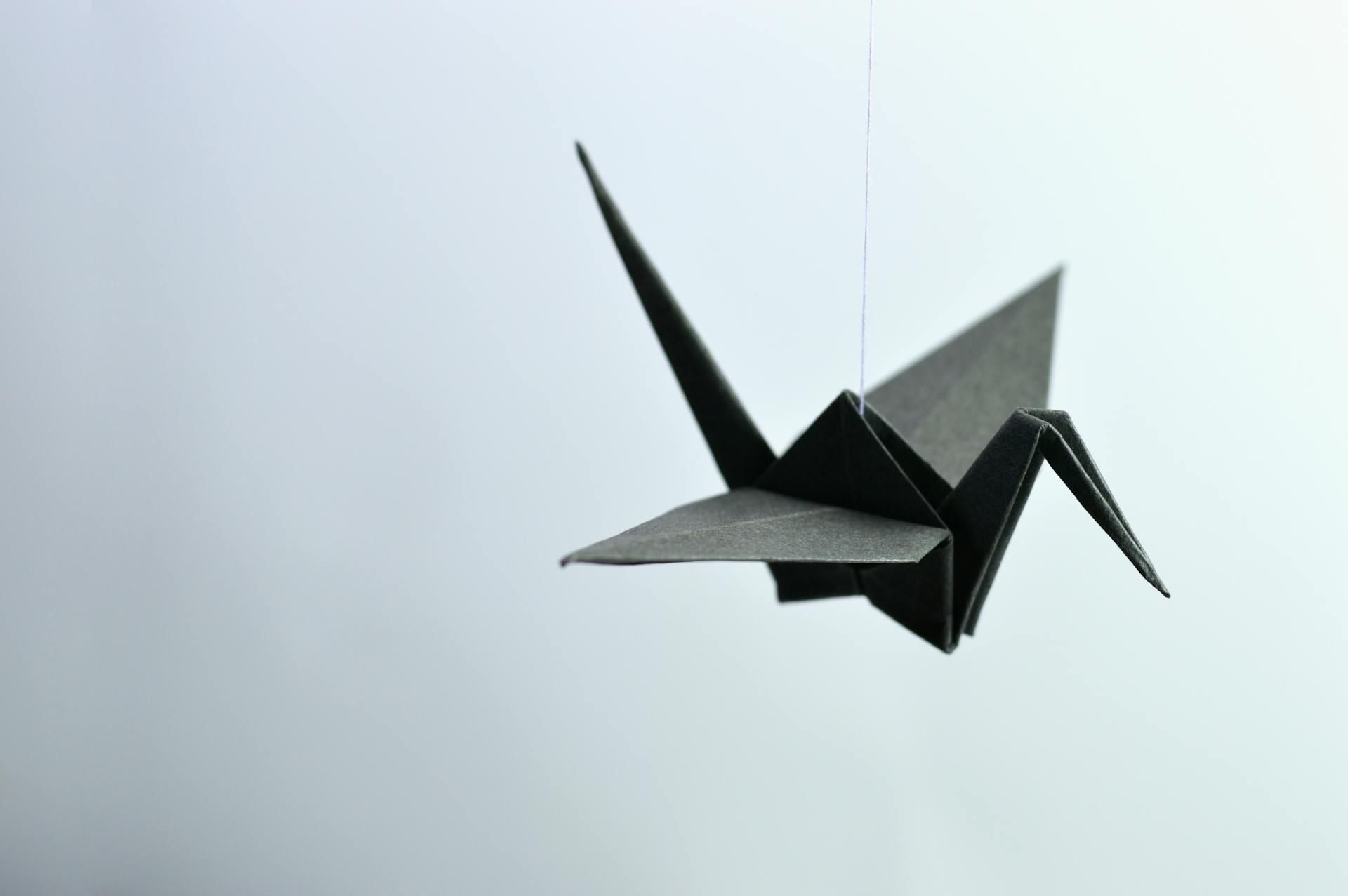 An origami bird floating.